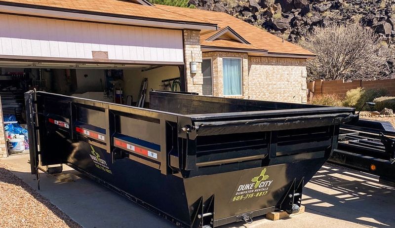 Loaded dumpster on a job site